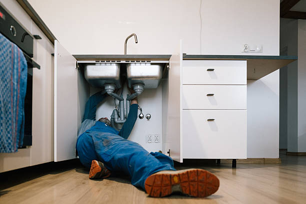 Professional Emergency Plumber technician working in Milford, PA